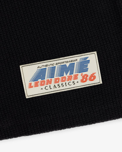 Aimé Leon Dore Jet black Long-Sleeve Mesh Football Tee Clothing